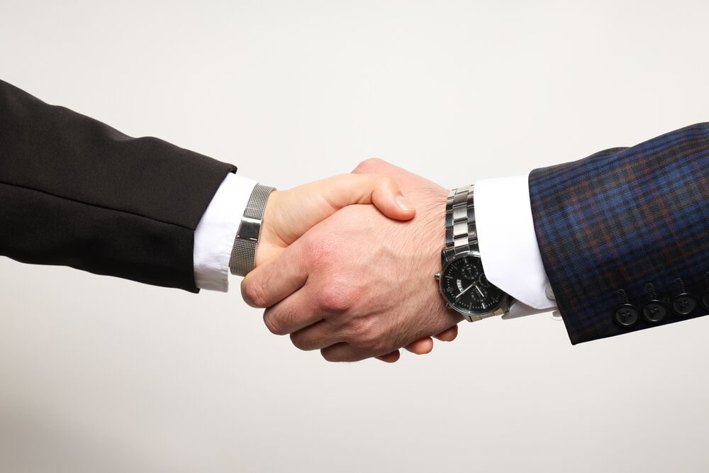 Business-Handshake – Vertrauensaufbau